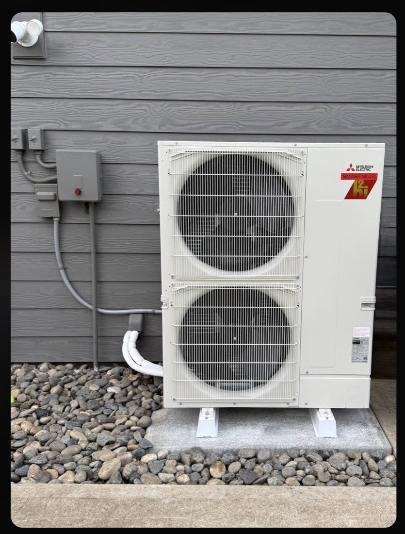 A Mitsubishi outdoor unit we installed on a new pad
