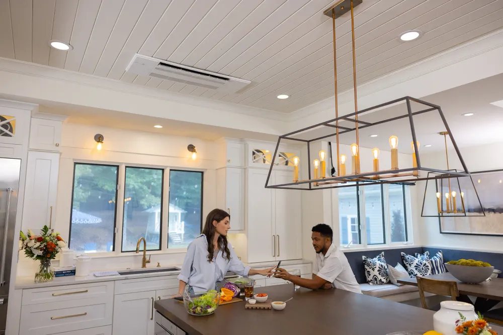 A Mitsubishi one-way ceiling cassette in a kitchen ceiling