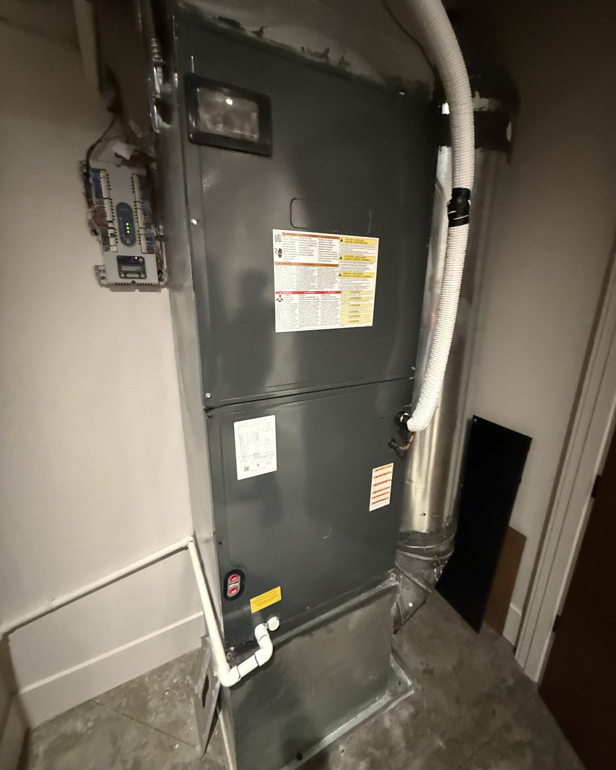 Before: old mismatched air handler